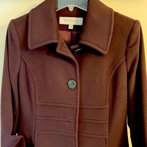 Stylish dress coat by Anne Klein. Never used.It has 2 pockets on the side. Cozy